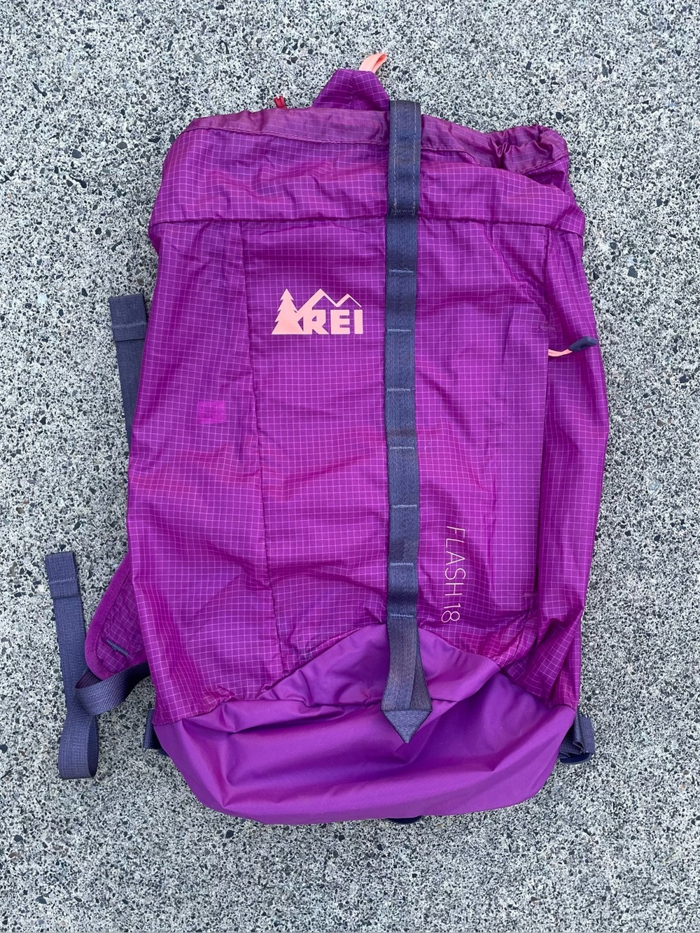 Purple REI Flash 18 hiking backpack